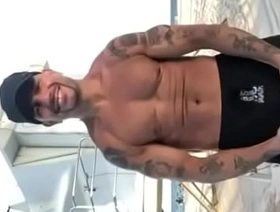THE PORN STAR CHAMPION MODELING SWIM TRUNKS AT THE BEACH