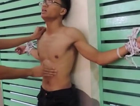 Asian boy gutpunch